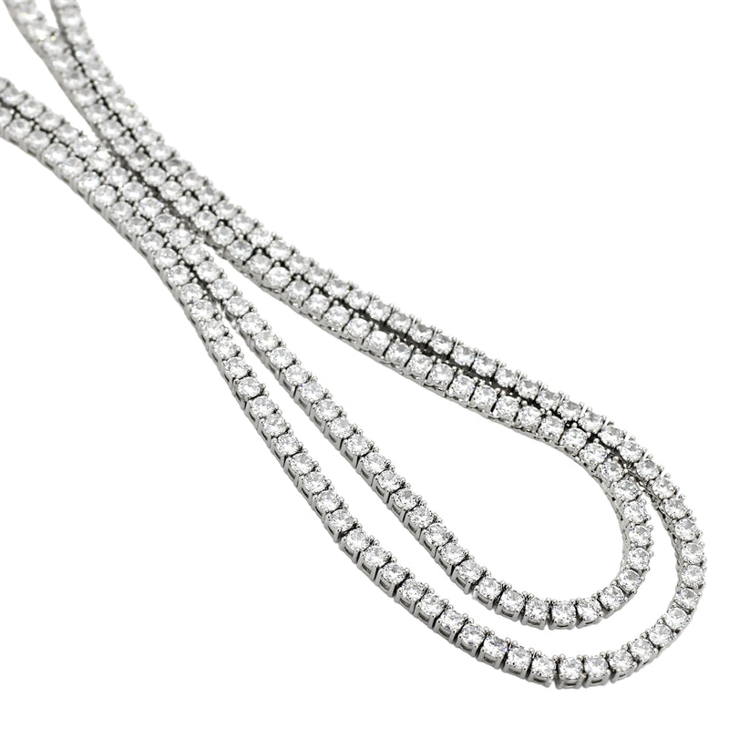 The TENNIS NECKLACE SET which includes two Rhodium-plated brass/cubic zirconia tennis necklaces in 16 and 18 inches length.