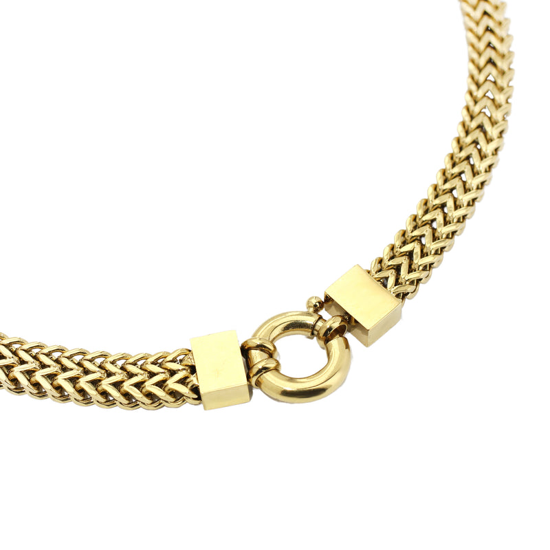 The MARINERO CHAIN which is an 18k gold plated stainless steel, 17 inches and 0.39" wide choker necklace that has a braided chain design.