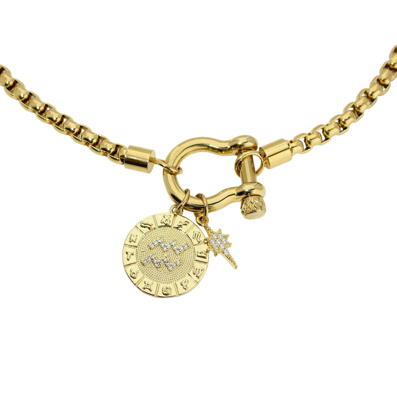 The Aquarius Herradura Zodiac Necklace which is made of 18” Hypoallergenic Gold Plated Stainless Steel chain with 18K Gold Plated Horseshoe clasp and miniature star pendant and circular star sign micro pave Aquarius constellation charm.