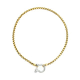 The Herradura Mix Necklace, a gold necklace featuring a box chain with a silver horseshoe clasp. |||Silver