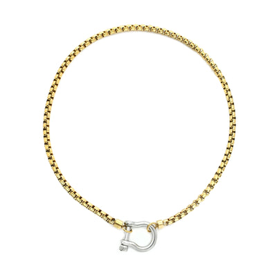 The Herradura Mix Necklace, a gold necklace featuring a box chain with a silver horseshoe clasp. |||Silver