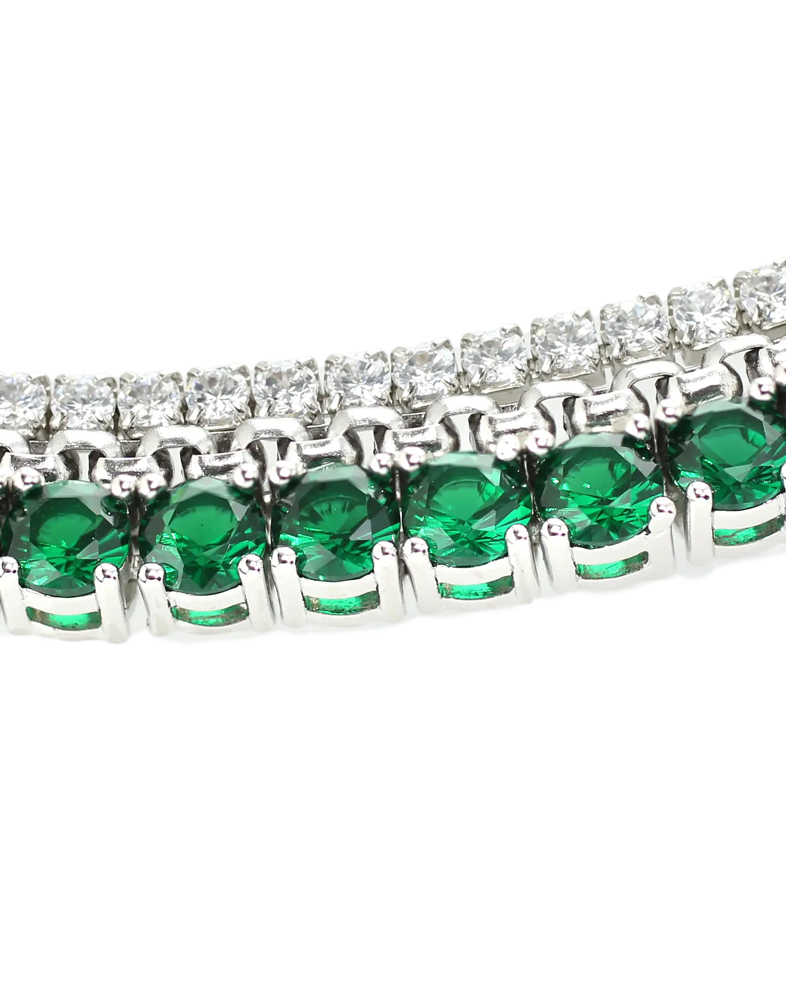 The EMERALD TENNIS NECKLACE SET which includes 3 layered necklaces. A Stainless steel Rhodium plated chain that is 1mm Wide, a 925 sterling silver cubic zirconia tennis necklace - 2 mm wide and Man made emerald rhodium-plated brass/cubic zirconia.