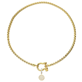 The Gold herradura necklace with the Circle Clip-On Charm, which is a two-toned charm featuring a circular gold pendant paved with sparkling diamonds and a silver clip embellished with a row of smaller diamonds.
