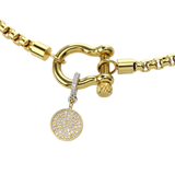 The gold herradura neecklace with the Circle Clip-On Charm, which is a two-toned charm featuring a circular gold pendant paved with sparkling diamonds and a silver clip embellished with a row of smaller diamonds.