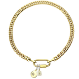 The Anne necklace in gold with two charms including the Celestial Star Clip On Charm, a gold charm with a  star design accented with pave diamonds and a silver clip-on bale and a gold round charm with diamond star detail.