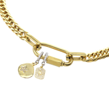 The Anne necklace in gold with two charms including the Celestial Star Clip On Charm, a gold charm with a  star design accented with pave diamonds and a silver clip-on bale and a gold round charm with diamond star detail.