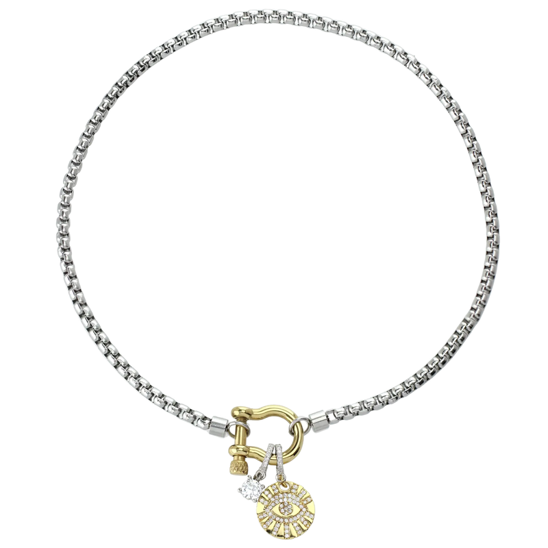 The Herradura Mix Necklace in silver chain and gold herradura clasp with the EVIL EYE 2 BOLT CLIP ON CHARM which is made of Pave Clip on Stainless steel 18k gold plated Zirconia Evil Eye and also the Solitaire Clip on Charm. 