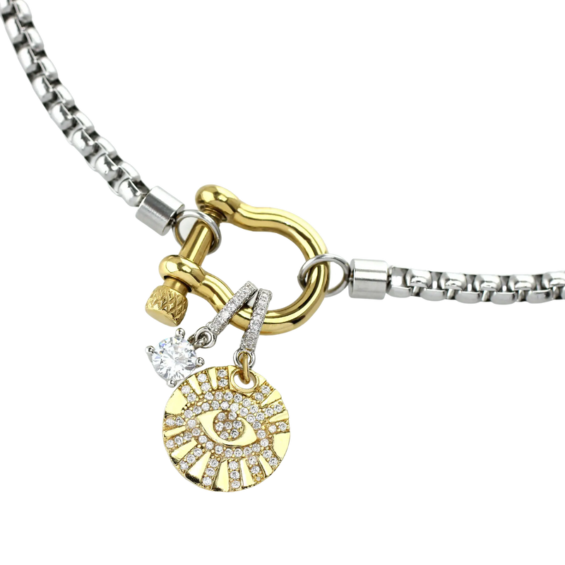 The Herradura Mix Necklace in silver chain and gold herradura clasp with the EVIL EYE 2 BOLT CLIP ON CHARM which is made of Pave Clip on Stainless steel 18k gold plated Zirconia Evil Eye and also the Solitaire Clip on Charm.