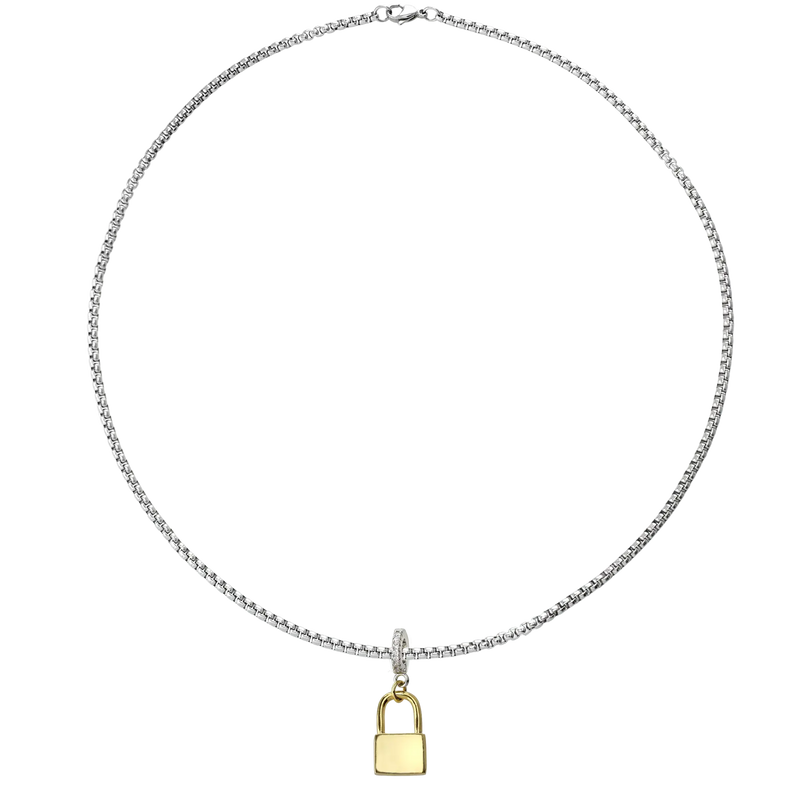 Silver necklace with the "Lock Clip on Charm" which is made of a Pave clip on Stainless steel 18k gold plated lock charm around 32mm in length.
